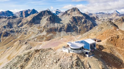 Bing wallpaper August 14, 2025. Cable car station on Piz Nair mountain, Graubünden, Switzerland (© Roberto Moiola/Alamy)
