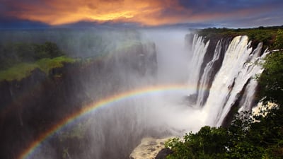 Bing wallpaper April 3, 2020. Rainbow at Victoria Falls in Zambia (© Dietmar Temps/Shutterstock)