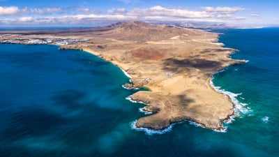 Bing wallpaper April 11, 2026. Papagayo Beach, Lanzarote, Canary Islands, Spain (© Gavin Hellier/Getty Images)