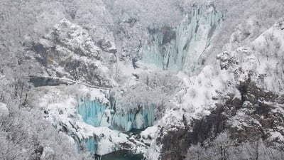 Bing wallpaper January 19, 2024. Frozen waterfalls in Plitvice Lakes National Park, Croatia (© Massimo_S8/Getty Images)
