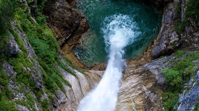 Bing wallpaper May 31, 2021. Waterfall at Pöllat Gorge near Neuschwanstein Castle, Bavaria, Germany (© Gary Whitton/Alamy)