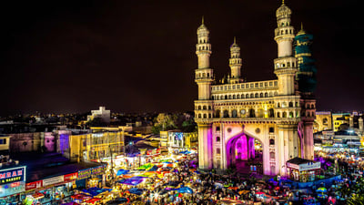 Bing wallpaper June 3, 2019. High angle view of illuminated Charminar amidst market at night. (© Nitish Adla/EyeEm/Getty Images)