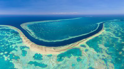 Bing wallpaper June 1, 2023. Aerial image of the Great Barrier Reef, Australia (© AirPano LLC/Amazing Aerial Agency)
