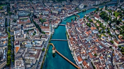 Bing wallpaper June 18, 2021. Aerial view of Chapel Bridge over the River Reuss in Lucerne, Switzerland (© Neleman Initiative/Gallery Stock)