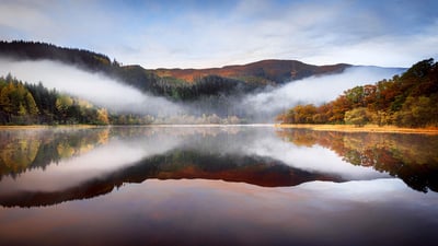 Bing wallpaper November 22, 2019. Low-lying cloud over Loch Chon, the Trossachs, Scotland (© Alistair Dick/Alamy)