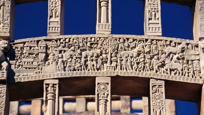Bing wallpaper December 25, 2023. Carved stories of King Ashoka on gate of Sanchi Stupa, Madhya Pradesh, India (© Dinodia Photos/Alamy Stock Photo)