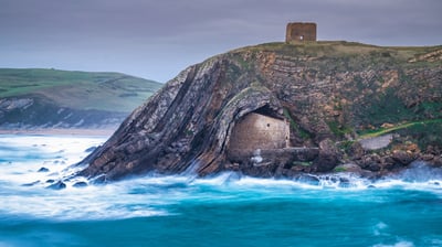 Bing wallpaper December 14, 2021. The chapel and hermitage of Santa Justa in Cantabria, Spain (© Luis Miguel Martin/Getty Images)