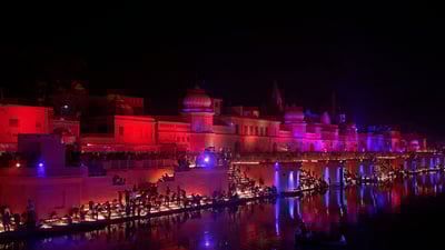 Bing wallpaper October 27, 2019. Devotees light oil lamps on the banks of the Sarayu River in Ayodhya, India (© Rajesh Kumar Singh/AP Photo)