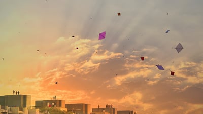 Bing wallpaper January 13, 2025. Sky full of kites (© anand purohit/Getty Images)