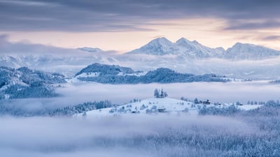 Bing wallpaper December 26, 2019. The Church of St. Thomas above the village of Praprotno, for Slovenia Independence and Unity Day (© Guy Edwardes/Minden Pictures)