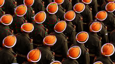 Bing wallpaper January 15, 2021. Indian army soldiers march during a dress rehearsal for the Republic Day parade (© Adnan Abidi/Reuters)