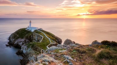 Bing wallpaper March 29, 2024. South Stack Lighthouse at sunset, Holy Island, Wales (© mariotlr/Getty Images)