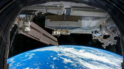 Bing wallpaper April 12, 2025. View from the cupola of the International Space Station above the South Pacific Ocean (© NASA)