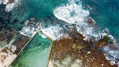 Bing wallpaper February 7, 2024. St. James Tidal Pool, Cape Town, South Africa (© AmazingAerialAgency/Adobe)