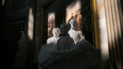 Bing wallpaper March 1, 2023. Portrait Monument of women's suffrage pioneers, Capitol Rotunda, Washington, DC (© Andrew Harrer/Bloomberg/Getty Images)