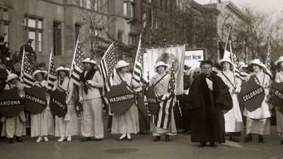 Bing wallpaper March 1, 2025. Dr. Anna Howard Shaw leading a suffrage parade in 1910s New York City (© Bettmann/Getty Images)
