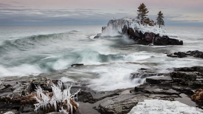 Bing wallpaper March 10, 2021. Snow and ice along the shoreline of Lake Superior in winter; Thunder Bay, Ontario (© plainpicture/Design Pics/Susan Dykstra)