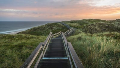 Bing wallpaper August 6, 2020. Boardwalk to the beach, Wenningstedt-Braderup, Sylt Island, Schleswig-Holstein, Germany (© Kerstin Bittner/Westend61/Offset by Shutterstock)