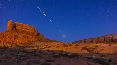 Bing wallpaper May 26, 2021. The total lunar eclipse of April 4, 2015, photographed over Monument Valley, Utah (© Alan Dyer/Alamy)