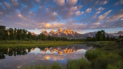 Bing wallpaper August 20, 2024. Sunrise at Grand Teton National Park, Wyoming (© Kurt Budliger/Tandem Stills + Motion)