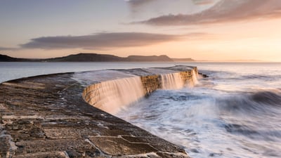 Bing wallpaper February 21, 2021. The Cobb breakwater, Lyme Regis, Dorset, England (© Ross Hoddinott/Offset by Shutterstock)