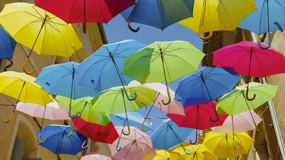 Bing wallpaper March 13, 2019. Parapluies colorés dans la rue de la Citadelle à Béziers, France (© Nicole Matthews/Westend61)