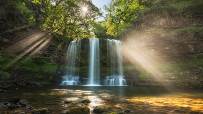 Bing wallpaper April 8, 2026. Cascade de Sgwd yr Eira, Parc national des Bannau Brycheiniog, Pays de Galles (© Guy Edwardes/Nature Picture Library)