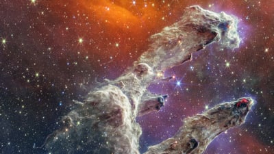 Bing wallpaper October 9, 2025. The Pillars of Creation viewed by the James Webb Space Telescope (© NASA)