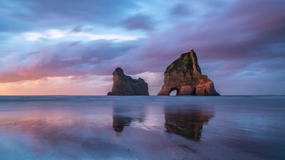 Bing wallpaper February 6, 2025. Archway Islands, Wharariki Beach, South Island, New Zealand (© Francesco Vaninetti/AWL/plainpicture)