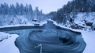 Bing wallpaper January 2, 2020. The whirlpool in Myllykoski scenic area, Oulanka National Park, Kuusamo, Finland (© Lassi Rautiainen/Minden Pictures)