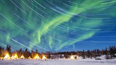 Bing wallpaper December 16, 2021. Star trail photography taken in Yellowknife (© Seong-won Jang/EyeEm/Getty Images)