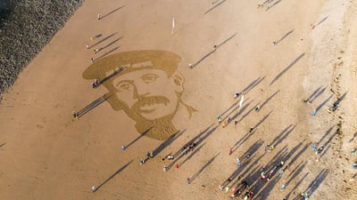 Bing wallpaper November 11, 2019. Sand portrait of WW1 Royal Naval Reservist Richard Davies on Ynyslas Beach, Ceredigion (© Keith Morris Aerial Imagery/Alamy Stock Photo)