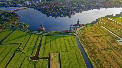 Bing wallpaper May 11, 2019. Historic windmills of Zaanse Schans near Amsterdam, Netherlands (© Matt Cooper/Gallery Stock)